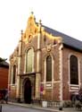 Sint-Gillis binnen Dendermondekerk DENDERMONDE foto: De huidige, driebeukige kerk heeft een barokgevel, o.a. versierd door voluten, muurankers en natuurstenen steunberen die contrasteren met de bakstenen gevel, uit 1779-1780